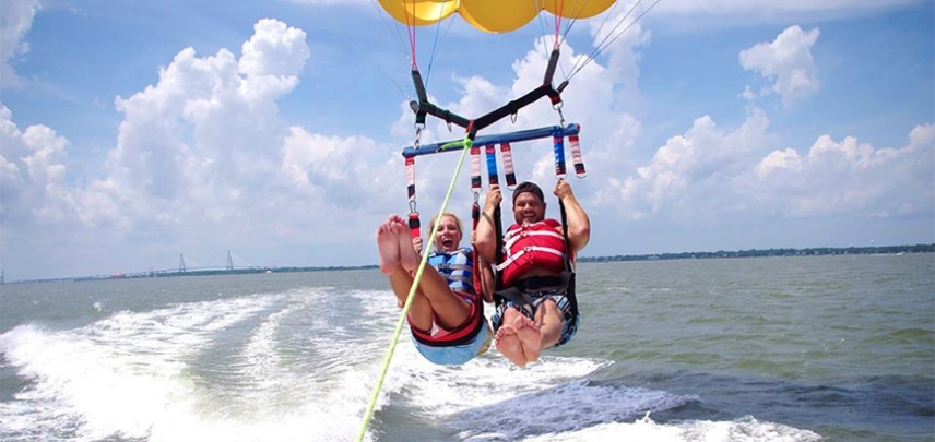 Parasailing with the Ravenel Bridge in the background.