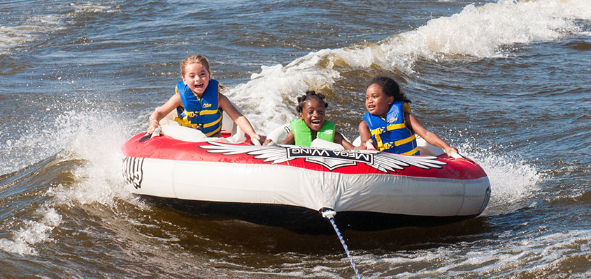 Pure joy tubing at Camp Happy Days. © 2014 Audra L. Gibson. All Rights Reserved.