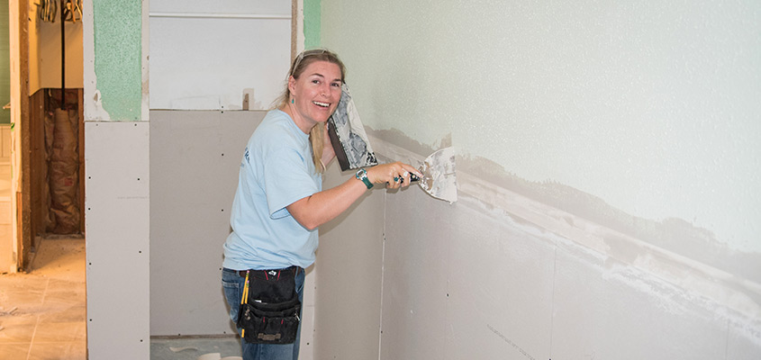 Taping drywall after Hurricane Harvey. © 2017 Butler Pearce. All Rights Reserved.