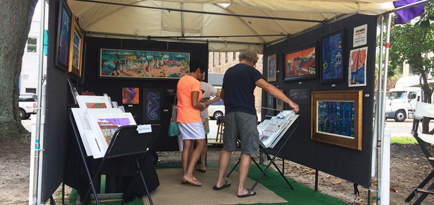 Art patrons take in artist, Tate Nation's, work in Marion Square