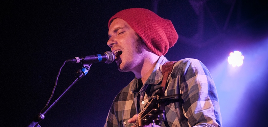 Josh Garrels on stage at the Music Farm.